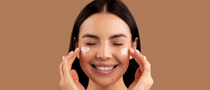 Treatment for post inflammatory hyperpigmentation - girl putting on something to her face